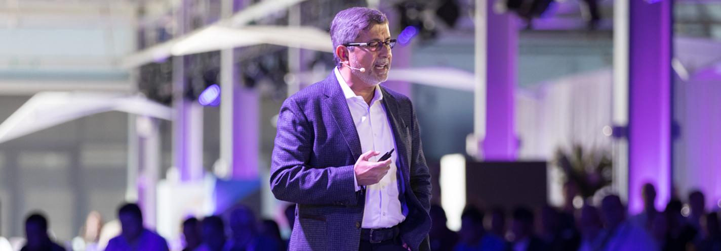 Sanjay Mehrotra speaking at an event