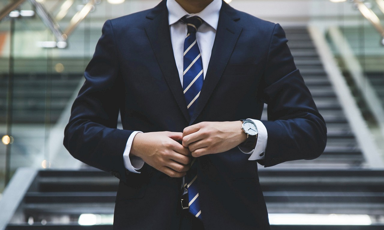 image of a man wearing a tie and suit 