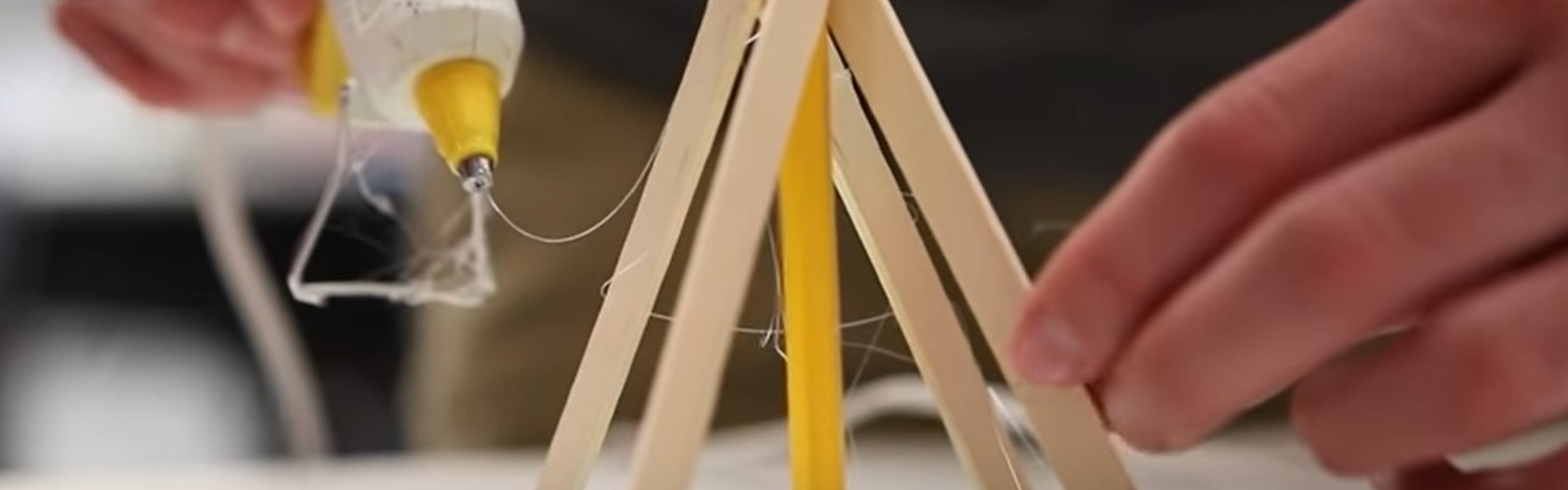 victor_chip_camp.jpg: Hand building with pencil, sticks, and glue