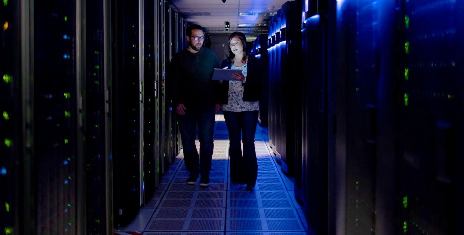 employees walking in a data center
